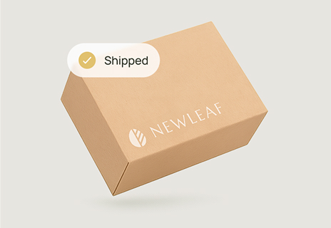 A cardboard box labeled "NEWLEAF" appears with a notification that reads "Shipped" and a yellow checkmark.